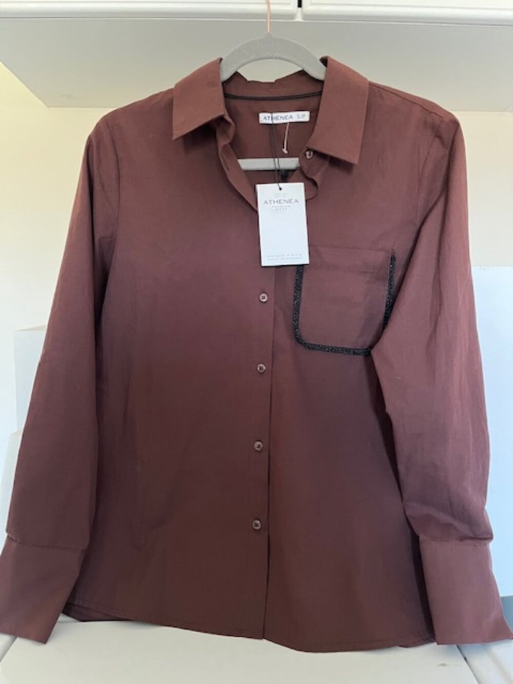 Athenea women’s long sleeve shirt.